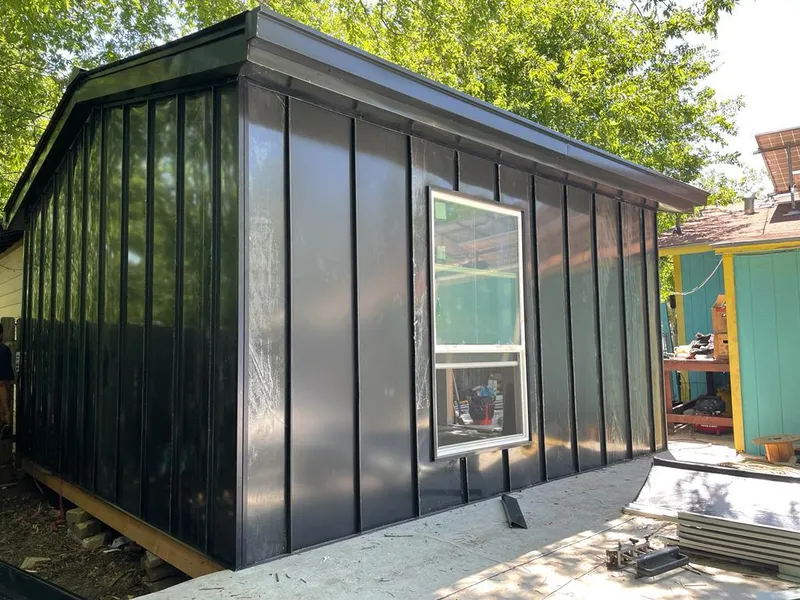 Black standing seam metal wall panels for Roof Inspection in Roanoke Rapids