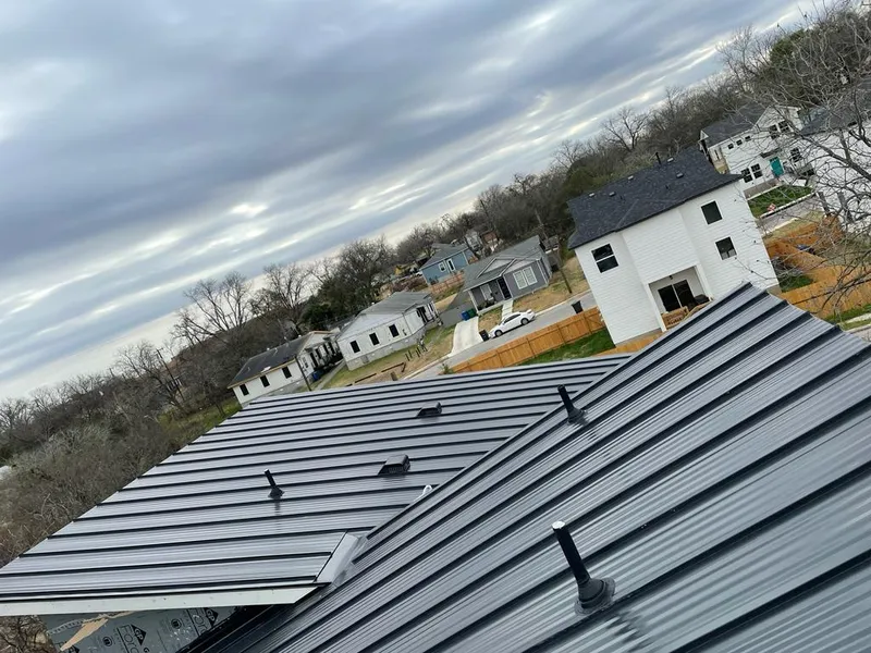 Standing seam metal roof panels with vents for Skylight Repair in Roanoke Rapids